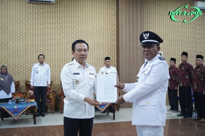 PJ Bupati Pringsewu Melantik Sopyan Sebagai PJ Kepala Pekon Bumirejo Kecamatan Pagelaran